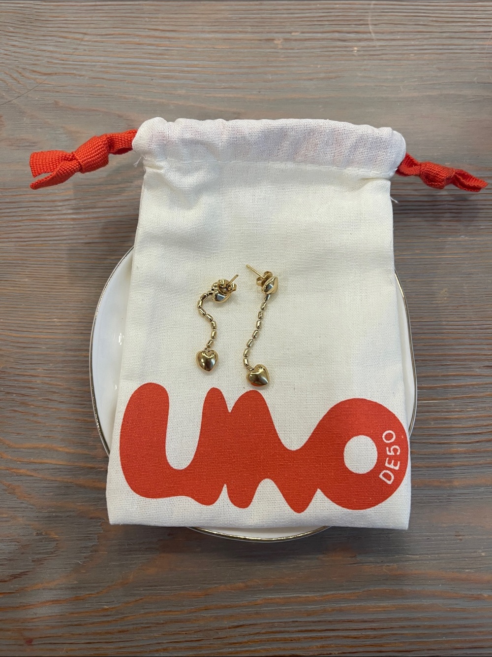 UNO de 50 drop earrings with small hearts, just like new.